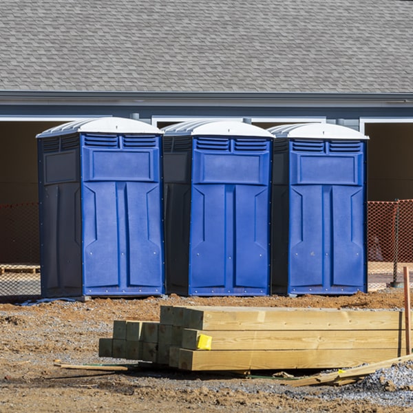 what is the cost difference between standard and deluxe porta potty rentals in Irasburg VT
